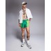 ASOS DESIGN swim shorts in super short length with placement animal print in green Зеленый, 2XL - W40-42